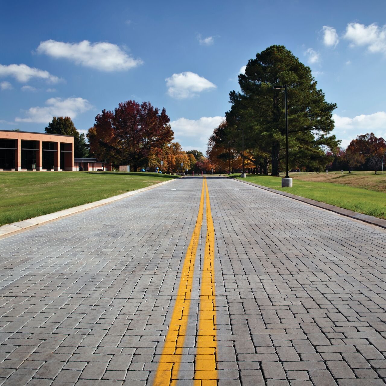 Commercial permeable paver roadway installed by Smarter Scapes